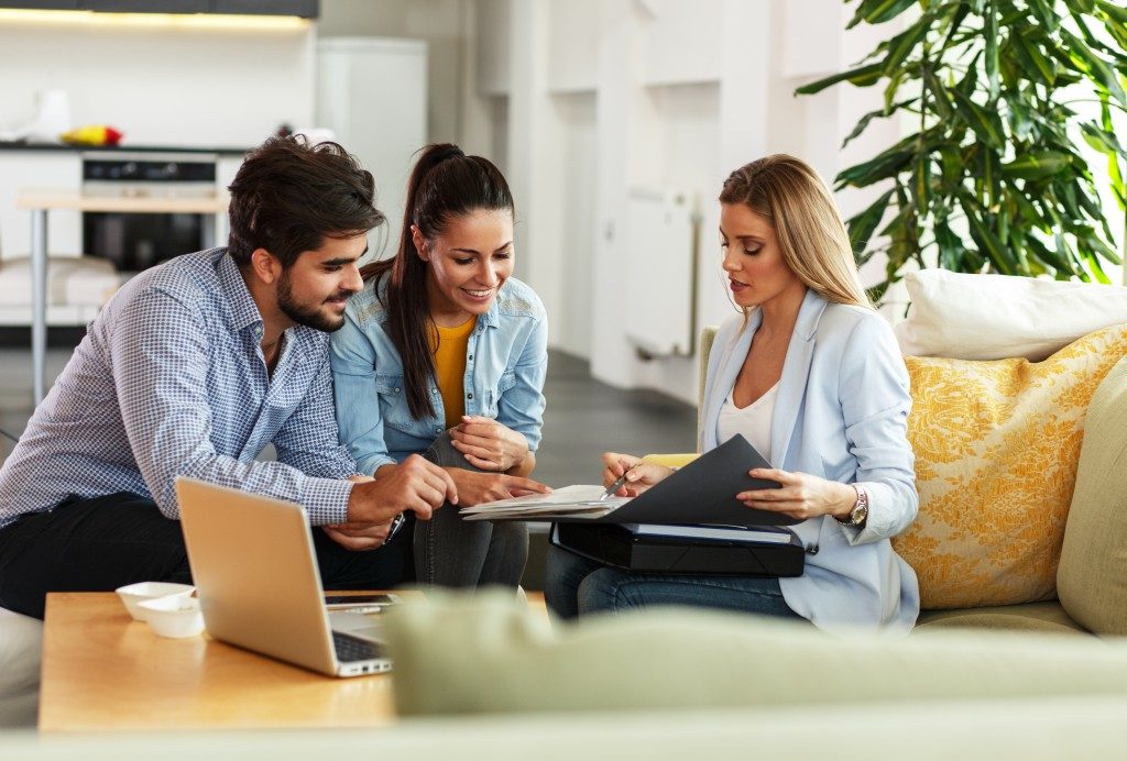 Couple inquiring about family insurance