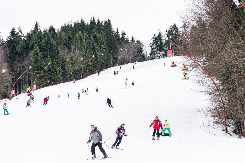 people skiing down the slope