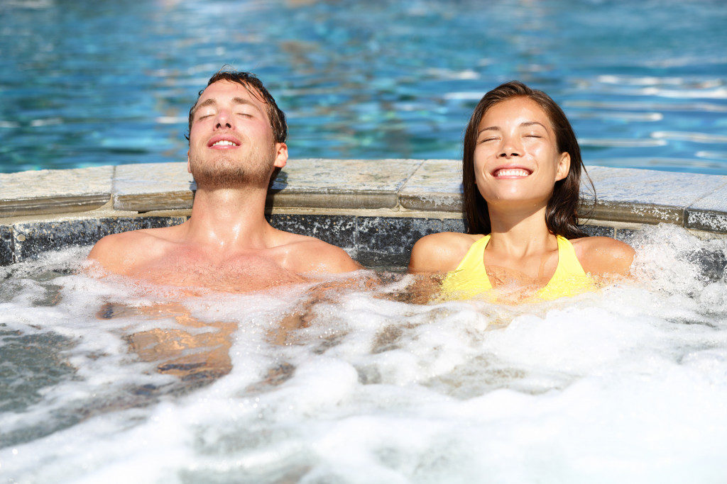 Male and female in a hot tub