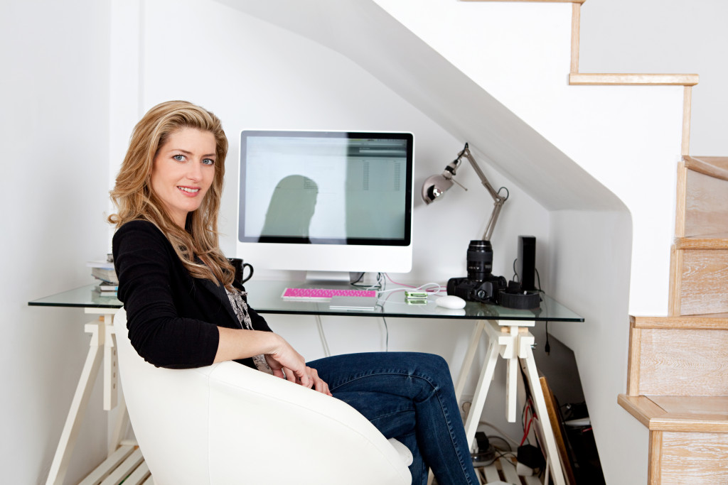 working from home and sitting at her desk 