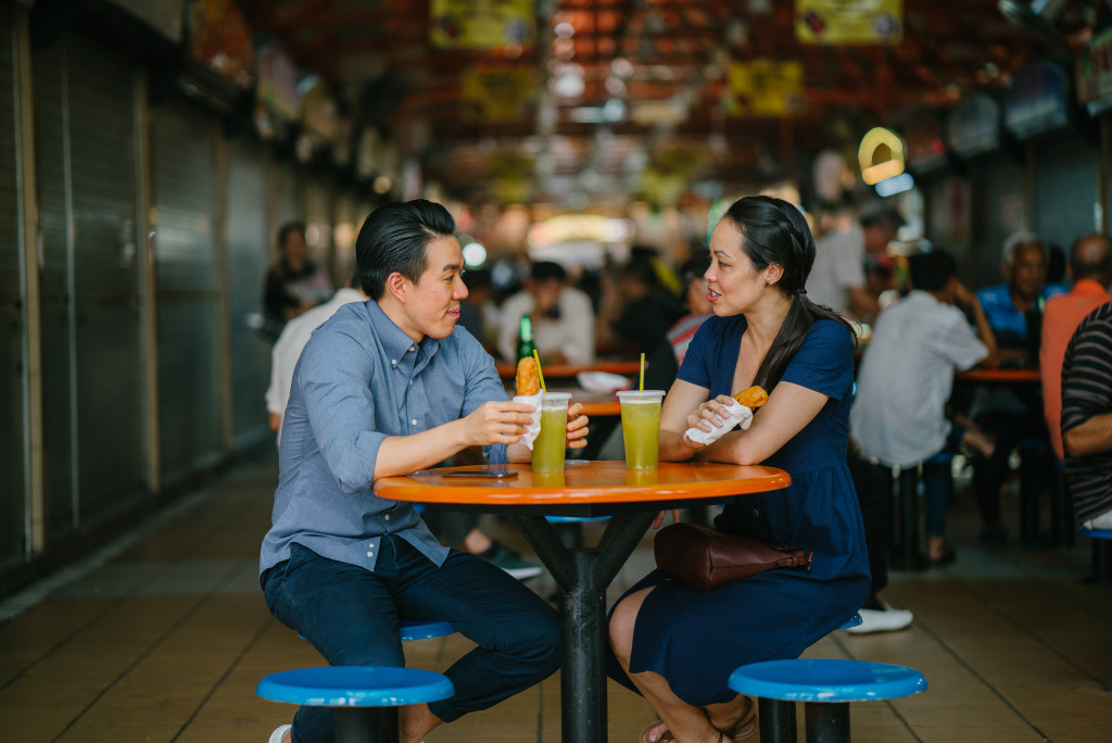 man and woman eating