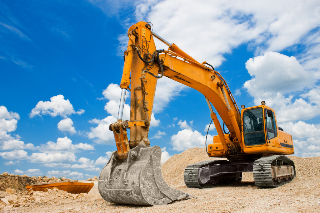 an excavator in an open lot 