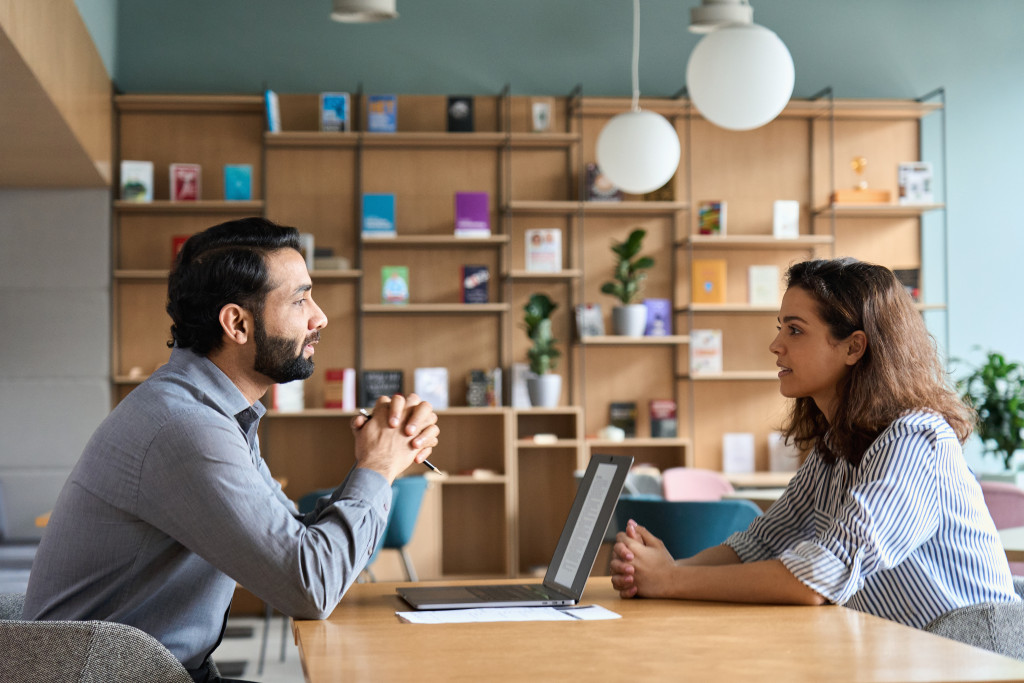 two people discussing