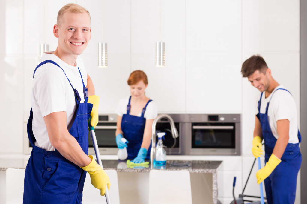 house cleaning workers in a house